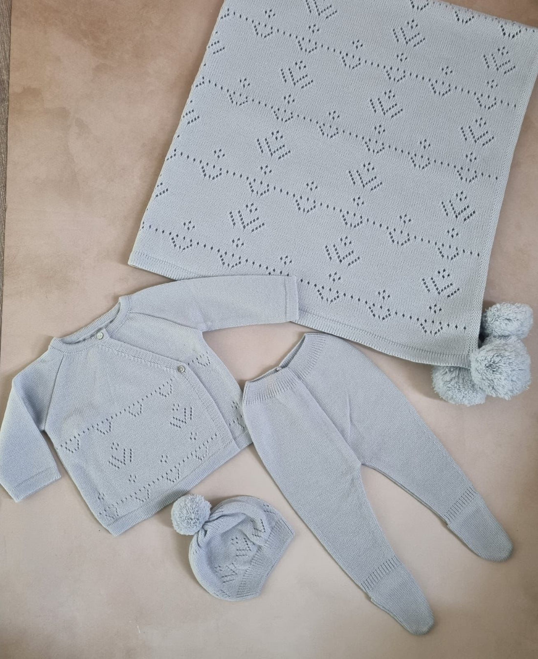 Conjunto color azul de punto y cobija personalizados