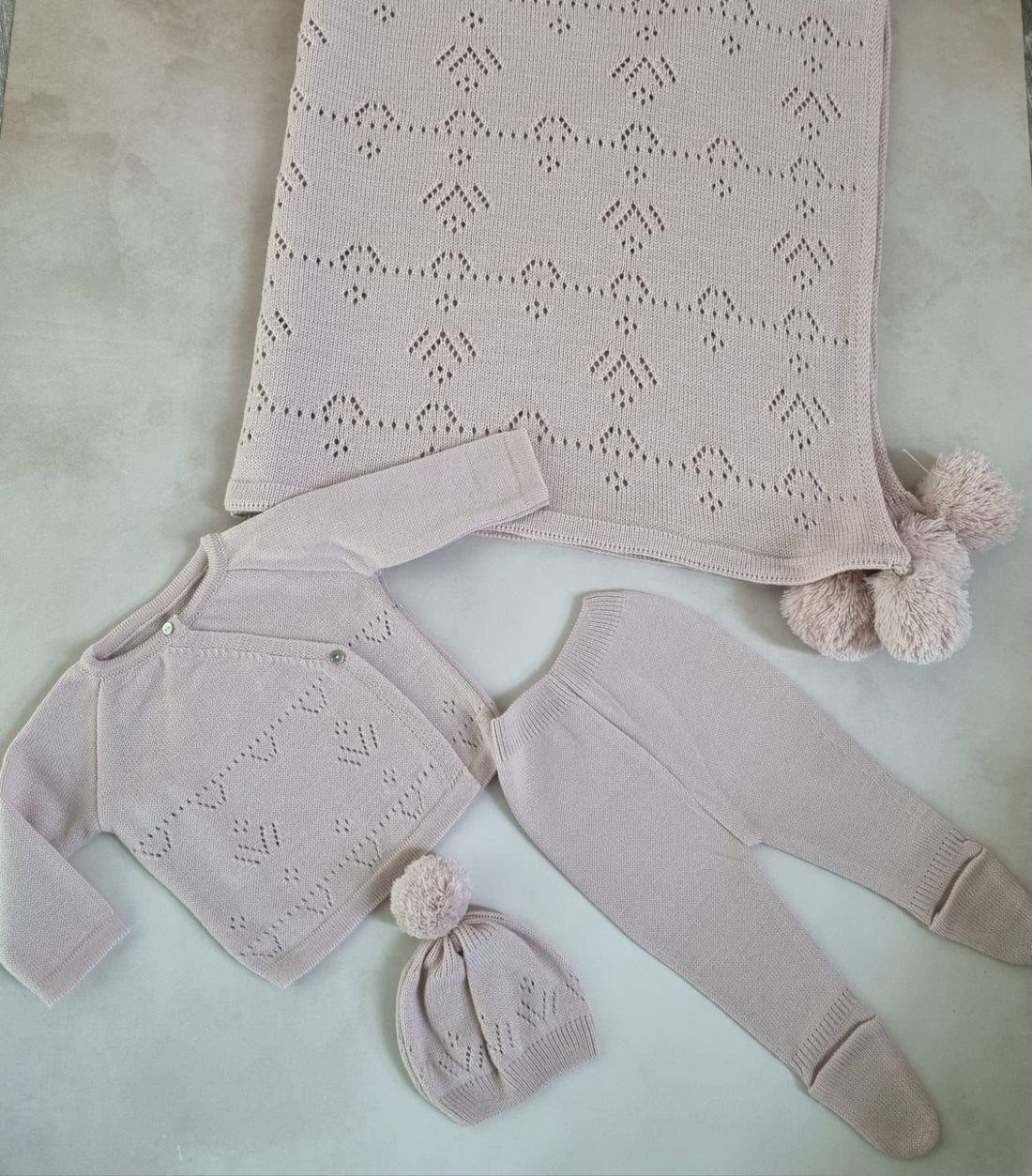 Conjunto color rosa de punto y cobija personalizados
